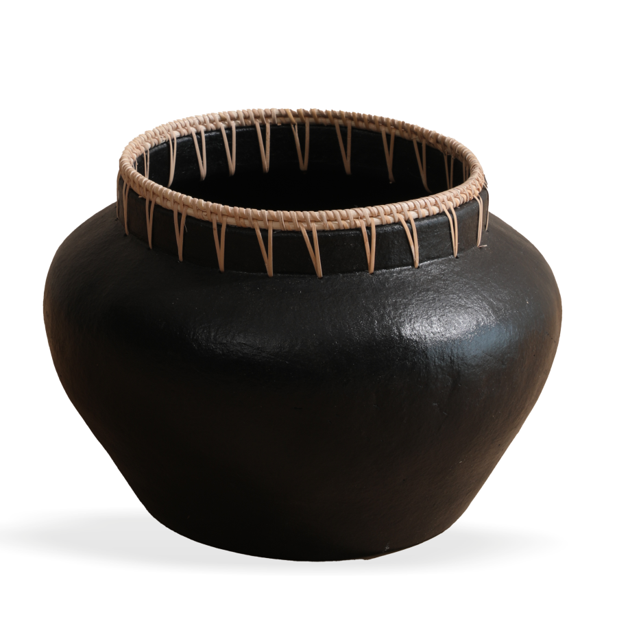 handcrafted black clay pot, black decorative vase with rattan rim,
artisanal ceramic pot décor, Boho style home décor pot.
tribal-inspired black vase
ethnic black earthenware pot