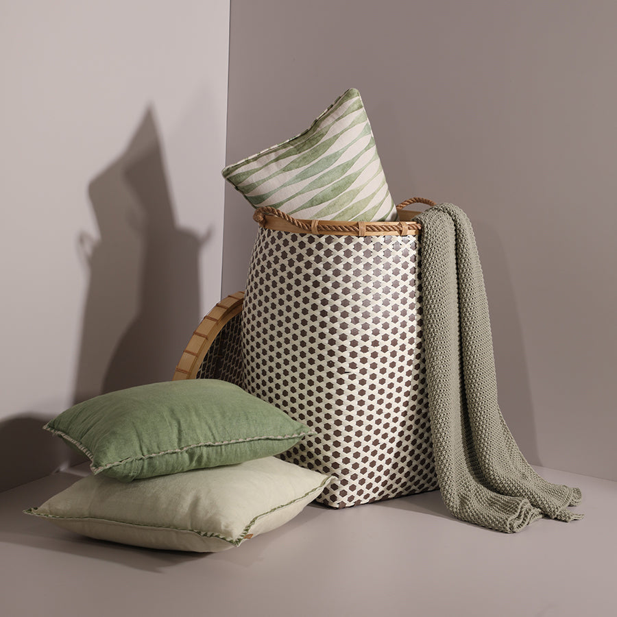 Woven laundry basket, Decorative storage basket with rope handles, Brown and cream plastic weave basket, Tall woven hamper for blankets, Eco-friendly handwoven basket, Green throw pillows, Light green and sage green cushion set, Decorative linen cushions for living room, Soft cotton cushions for home décor, Eco-style green cushions.
