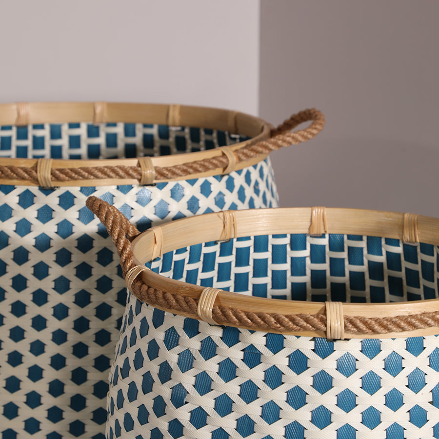 Open-top woven storage basket, Handwoven blue and white basket,
Rope handle basket for storage,
Decorative bamboo rim basket, Artisan home storage bin, Eco-friendly woven basket, Tall laundry hamper basket, Handmade woven organizer, Natural fiber basket with rope detail, Blue geometric pattern storage basket, Bohemian style storage basket, Plastic strip woven laundry basket, Lightweight woven bin for home use, Contemporary decorative basket.