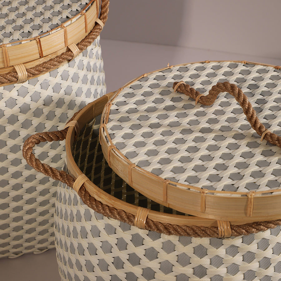 Woven basket with lid, Decorative storage basket, Rope handle laundry basket, Bamboo rim woven bin, Lidded wicker-style basket, Stylish home storage basket with rope handles, Durable woven hamper with lid, Handwoven basket for laundry and toys, Eco-friendly lidded storage container, Multi-use basket for bedroom or bathroom.