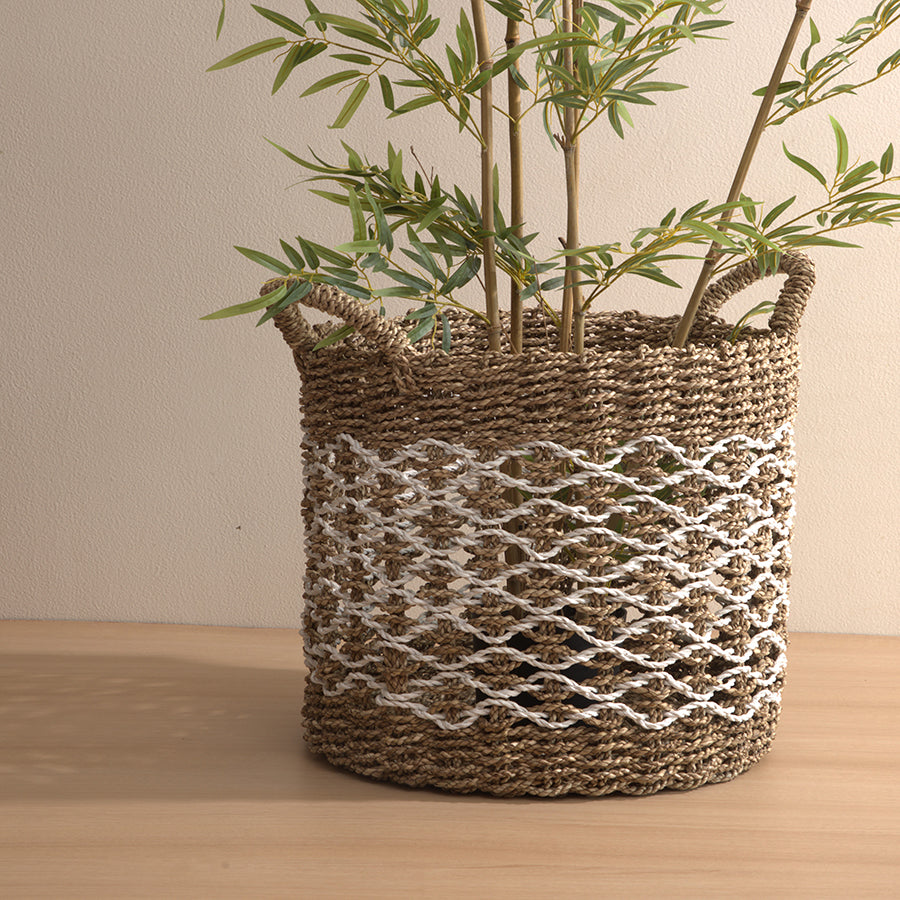Zigzag weave jute basket, Handwoven seagrass basket, Boho plant holder basket, Rustic decorative basket, Eco-friendly woven bin, 
Indoor planter basket, Plant pot cover basket, Floor storage basket, Living room décor basket, Multipurpose woven basket, Modern natural home décor, Minimalist storage basket, Boho chic interior accessory, Neutral tone home styling, Textured basket for décor.