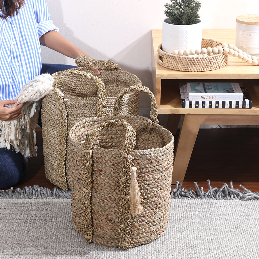 Handwoven seagrass basket set,
Natural tassel storage baskets,
Decorative woven baskets with handles, Blanket storage baskets,
Stylish home organization baskets,
Toy or laundry basket set, Wooden side table décor, Boho accent table styling .