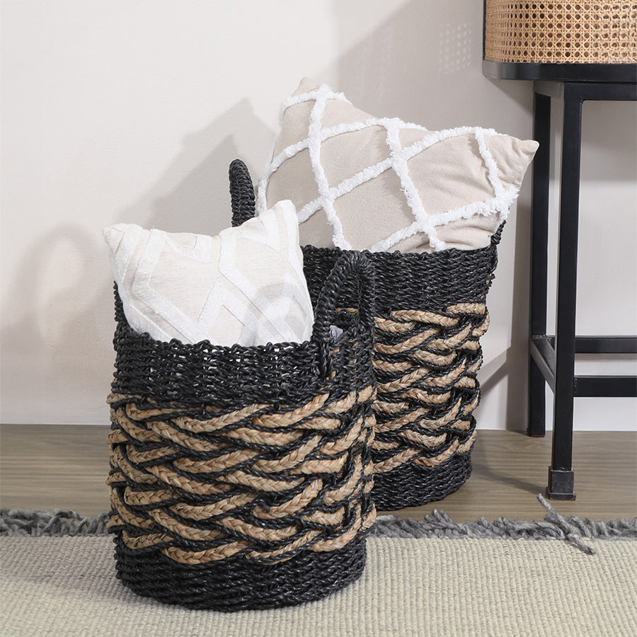 black and natural woven basket set, 
handwoven storage baskets with handles, seagrass and jute decorative baskets, braided rope storage hamper, Boho-style woven baskets, modern rustic storage baskets with pillows, two-tone woven floor baskets, large and small black braided baskets, handmade baskets for living room décor, stylish toy or blanket storage baskets.