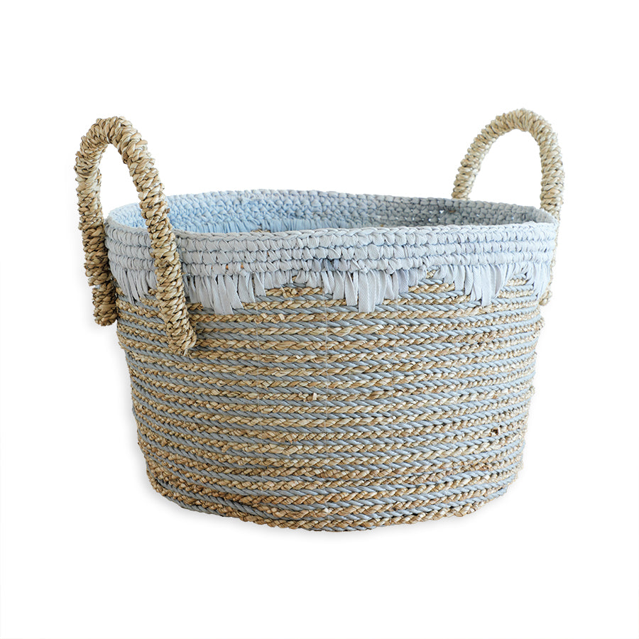 Handwoven storage basket, Grey and natural jute basket, Decorative rope basket with handles, Woven basket with blue trim, Eco-friendly seagrass basket, Two-tone woven utility basket, Handcrafted Boho storage basket, Stylish round basket with fringe, Decorative storage basket with handles and fringe, Coastal-style woven rope basket for home, 
Blue and beige jute basket for living room, Soft-touch woven organizer for toys or laundry, Multipurpose handwoven seagrass basket.
