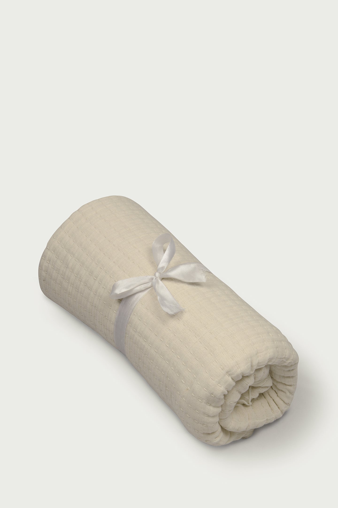 Gift throw blanket, Rolled cotton blanket, Cream throw gift, Cozy gift idea, Soft cotton blanket, Rolled throw with ribbon, Soft rolled throw blanket with ribbon, Waffle weave cotton throw for gifting, Neutral home throw blanket wrapped for gift .