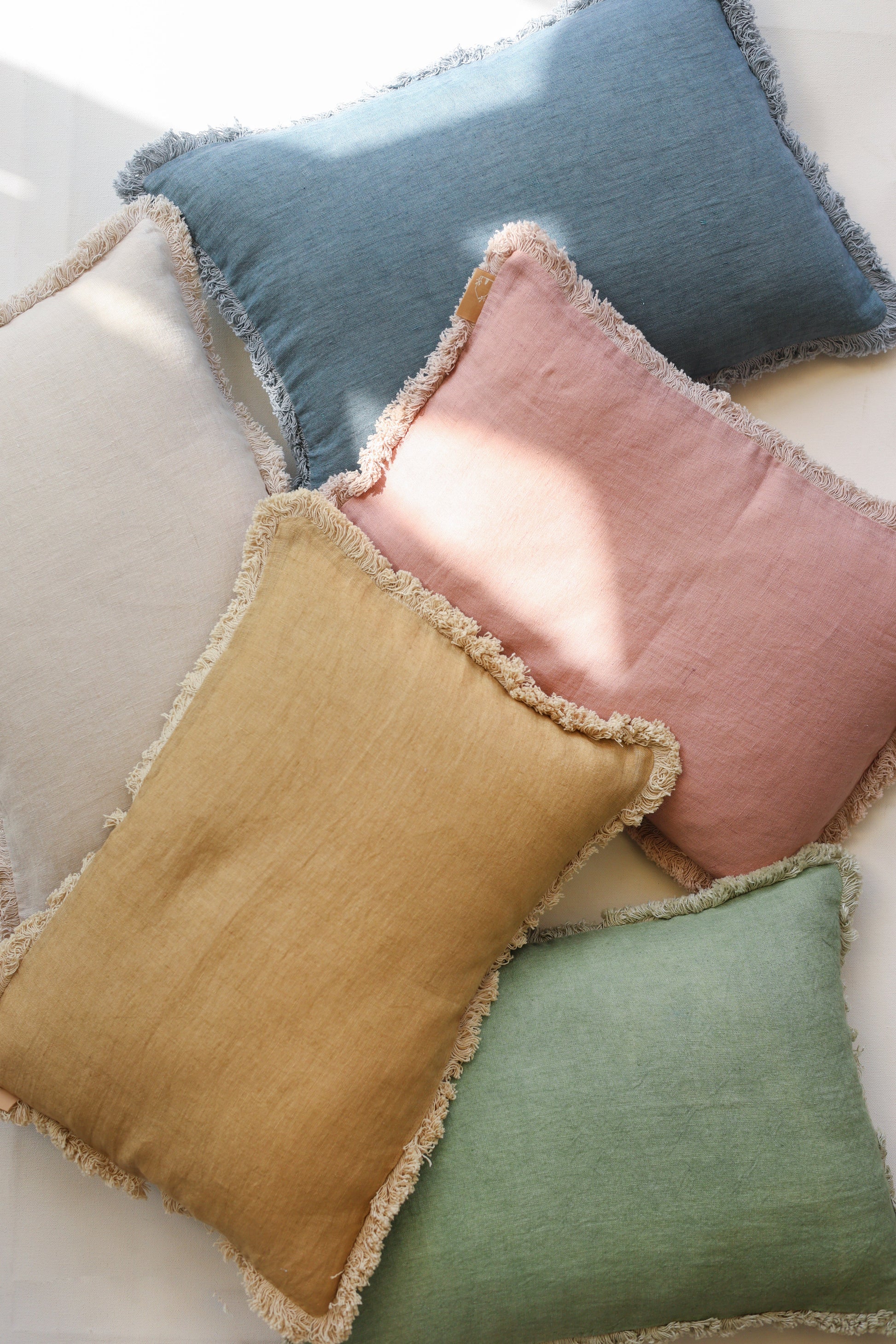 Fringed linen cushions, Colorful throw pillows, Decorative fringe cushions, Soft cotton cushion covers, Cozy decorative pillows, Sofa cushions with fringe, Textured home décor cushions, Neutral and pastel cushion set, Living room pillow décor .