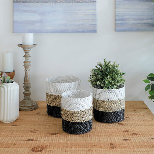 Black white natural woven basket,
Color block rope storage basket, Decorative handwoven basket set, Mini planter basket, Small rope baskets for home décor, Modern farmhouse style storage baskets, Handcrafted multi-tone basket set, Natural fiber rope planters,
Stylish organizer baskets for shelves.