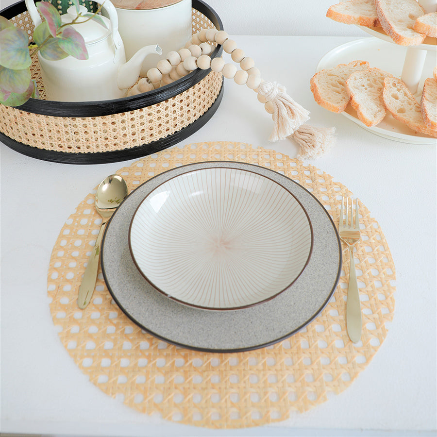 Round cane placemat, Natural rattan placemat, Cane webbing table mat, Open weave round placemat, Handwoven cane table décor,
Eco-friendly placemat for dining, Boho chic placemat, Woven bamboo placemat, Rattan napkin ring, Natural woven napkin holder, Handmade cane napkin ring, Boho dining napkin accessory, Beige cotton table napkin, Eco-friendly fabric napkin,
Linen napkin with rattan ring.