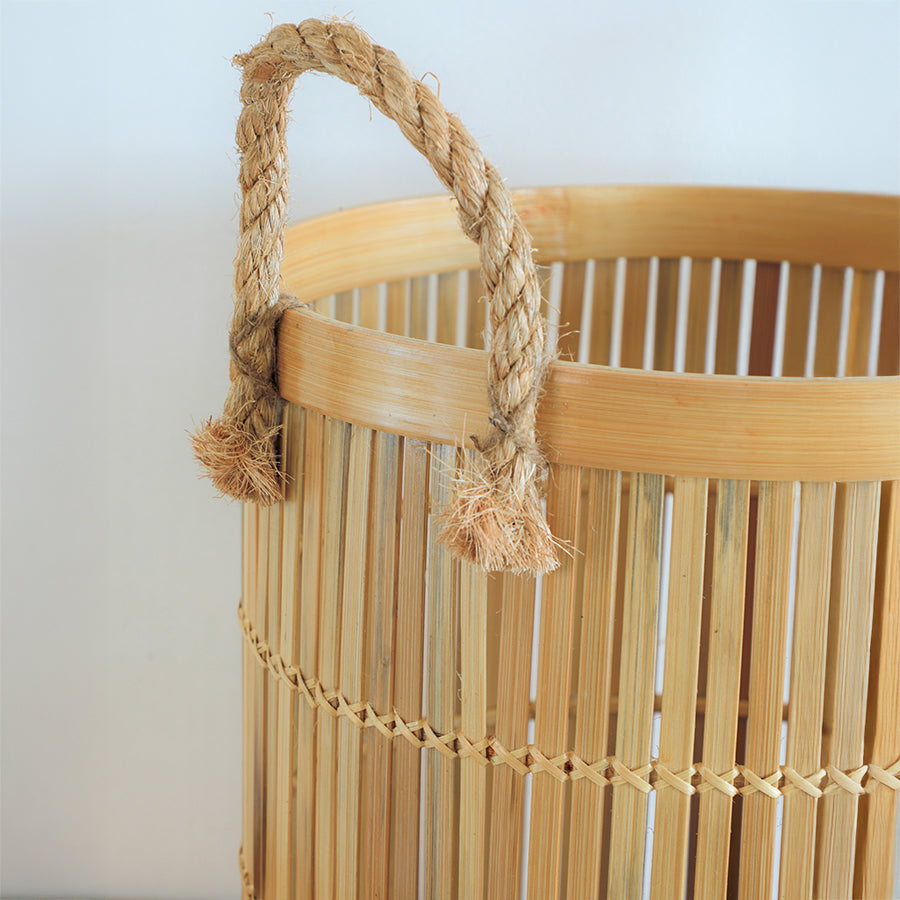 Bamboo basket with rope handles, Natural bamboo storage basket, Handwoven bamboo basket, Eco-friendly woven basket, Sustainable bamboo organizer, Rustic bamboo home décor, Artisan bamboo basket, 
Bamboo basket with jute rope, Decorative slatted bamboo basket, 
Handmade bamboo container, Handcrafted bamboo décor , Organic bamboo weaving, Natural jute rope handle, Raw bamboo finish, Woven storage solution, Handmade bamboo craftsmanship.