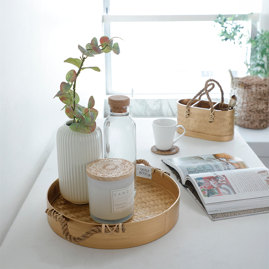 Round bamboo tray, Woven bamboo serving tray, Rope handle decorative tray, Eco-friendly serving tray, Handmade bamboo tray, Rustic bamboo centerpiece, Gold bamboo tray for décor, Natural woven tray with handles, White ribbed ceramic vase, Minimalist flower vase, Faux eucalyptus plant décor, Decorative table vase, Ceramic vase with greenery, Modern tabletop vase,
Artificial plant home décor .