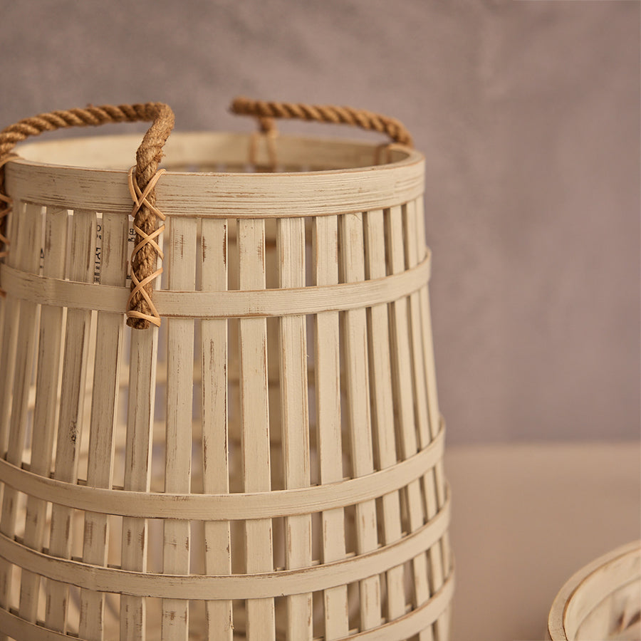 Bamboo storage basket, Woven laundry basket, Rustic bamboo basket, Rope handle storage bin, Open weave bamboo hamper, Decorative basket with handles, 
Natural bamboo basket with rope handles, Lightweight decorative bamboo storage basket, Sustainable woven laundry basket for home.
Eco-friendly storage solution
Handcrafted bamboo hamper
Boho home decor basket
Slatted bamboo laundry bin