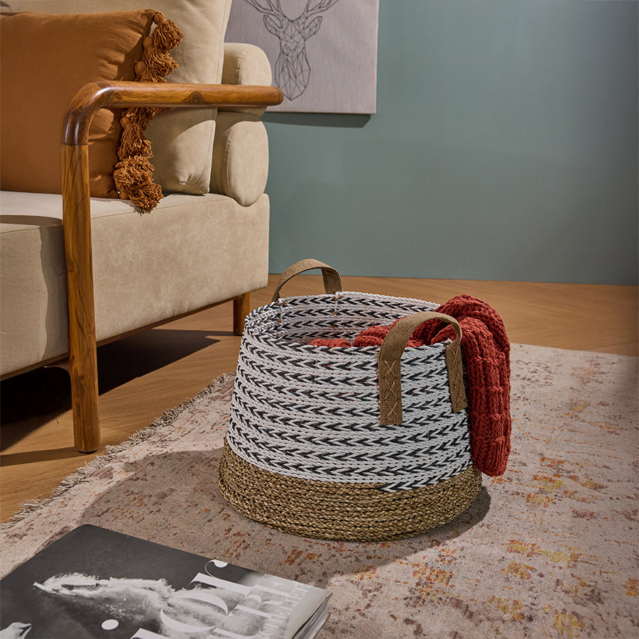Decorative woven rope basket, Black and white rope storage bin, Two-tone jute and cotton basket, Mid-century modern wooden arm sofa, Beige upholstered loveseat, Modern Boho living room décor, Stylish home organization idea.