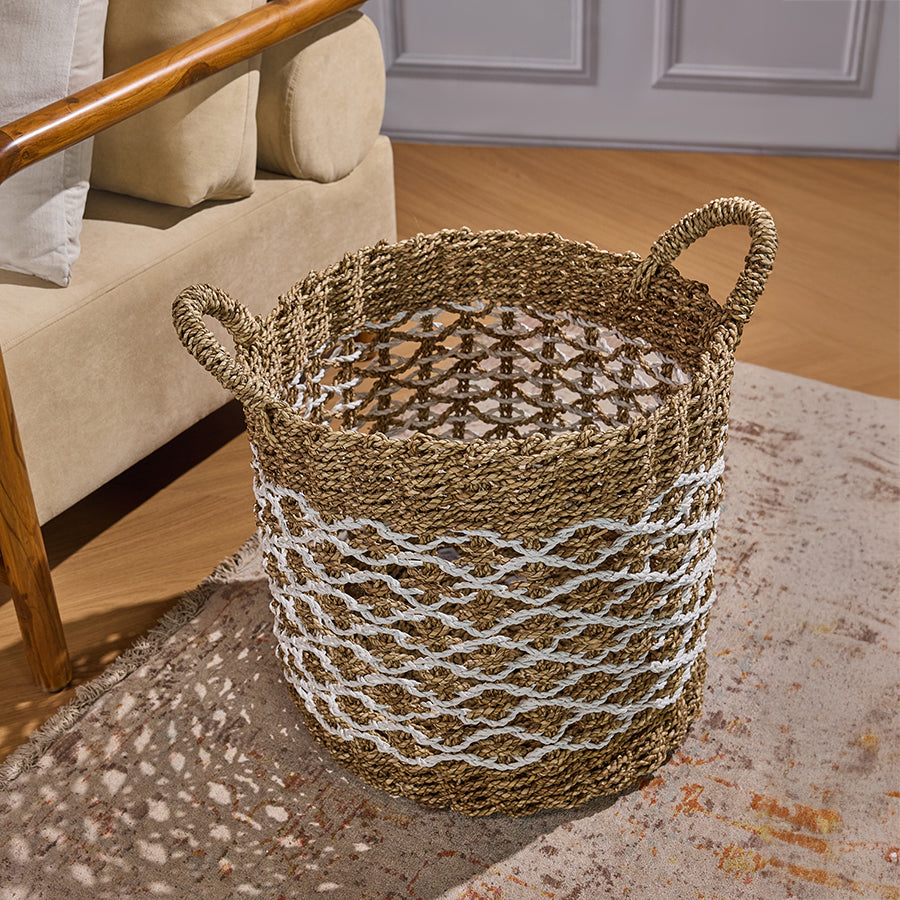 Handwoven zigzag basket, Natural jute storage basket, White pattern woven bin, Seagrass basket with handles, Eco-friendly decorative basket, Living room storage basket, 
Modern Boho home basket, 
Organizer basket for blankets/toys, 
Multipurpose floor basket, Rustic home décor storage, Boho chic woven basket, Artisan rope weave basket, Open weave decorative basket, Handcrafted basket with white accent, Textured seagrass home décor.
