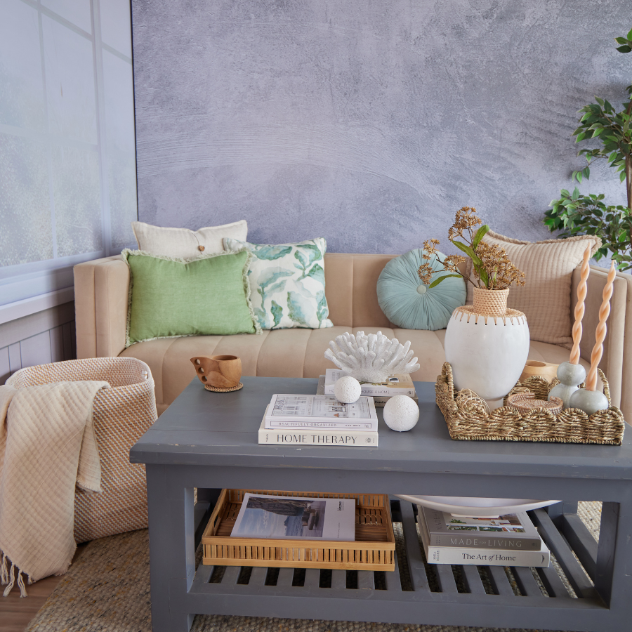 modern beige velvet sofa, minimalist neutral couch, cozy living room sofa,
soft fabric 3-seater couch, neutral tone home furniture, green throw pillows, botanical print cushions,
round pleated cushion, pastel accent pillows, cotton sofa cushion covers.