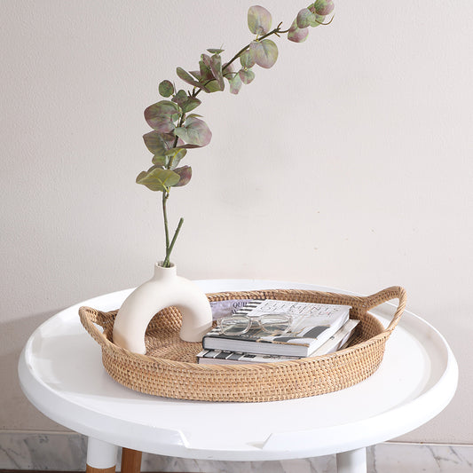 Woven rattan display tray, Oval wicker tray with handles, Decorative coffee table tray, Minimalist tabletop décor tray, Modern Boho rattan tray, Wicker tray for organizing essentials, 
Stylish tray for center table setup.