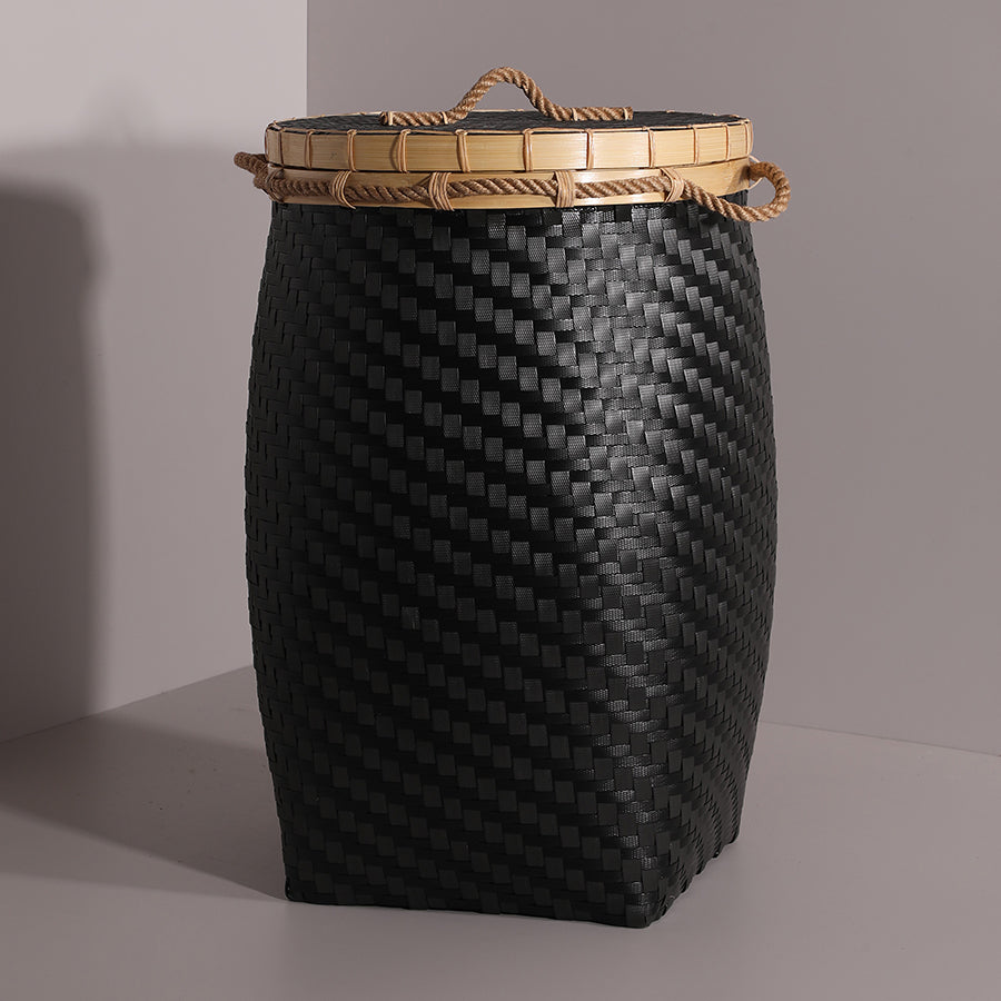 Black woven storage basket, Black laundry hamper with lid, Handcrafted basket with bamboo lid, Rope handle woven basket, Tall black storage bin, 
Eco-friendly woven hamper, 
Plastic strip handwoven basket, 
Bamboo and rope handle storage basket, Matte black basket with tight weave, Durable lidded organizer bin, 
Modern black storage hamper. 

