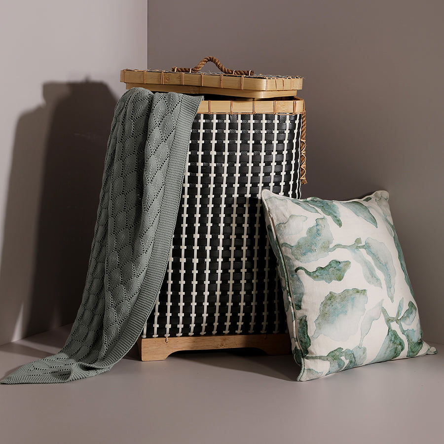 Woven laundry hamper with lid, Black and beige wicker basket, Handmade rattan laundry bin, Decorative hamper with rope handles, Eco-friendly storage basket, Rectangular woven storage hamper, Laundry basket with wooden base, Stylish bedroom hamper, Modern home organization basket, Fabric-lined wicker laundry bin, Rustic laundry hamper for home décor , Tall woven hamper with lid and handles. 