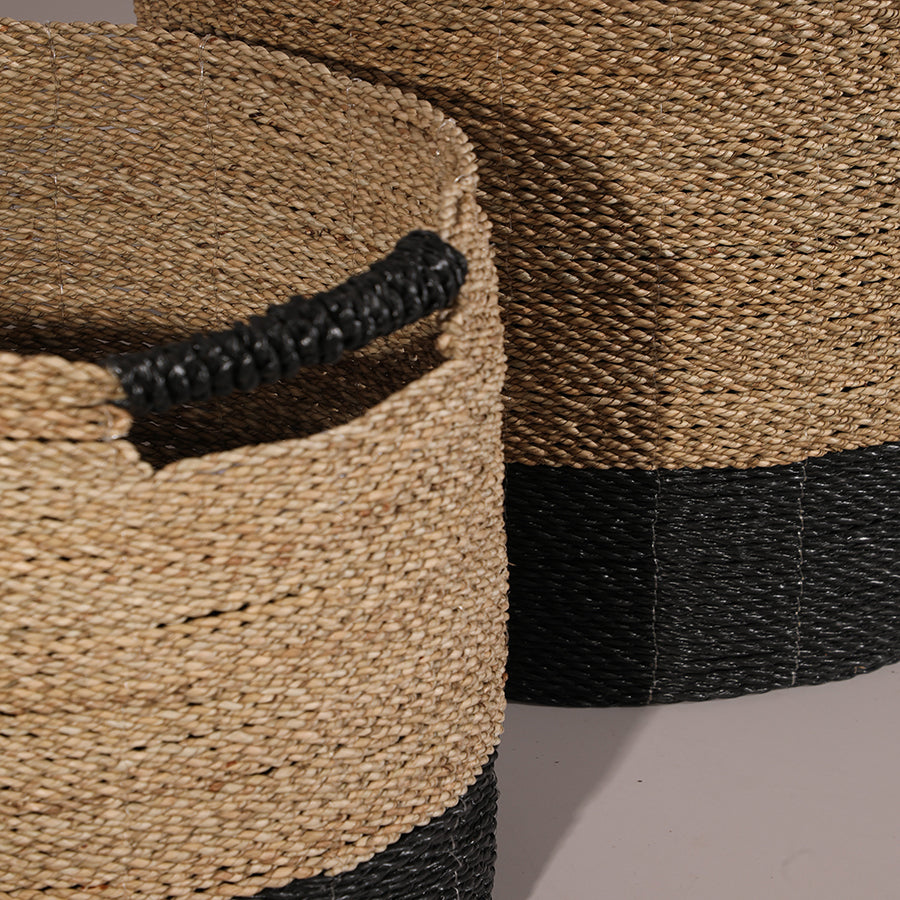 Handwoven seagrass storage basket, 
Natural and black woven basket, Eco-conscious woven home décor , Durable natural fiber basket, Hand-braided storage hamper, Sturdy handmade basket for laundry or blankets, Decorative woven bin for modern interiors.