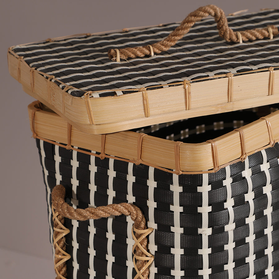 Woven storage basket with lid, Handmade rattan basket, Black and white basket , Decorative woven basket, Eco-friendly storage basket, 
Stylish woven basket for home organization, Black and natural color storage basket with lid, Traditional handwoven basket for living room, Multipurpose storage basket with rope handles, Sustainable home décor storage basket, Boho chic woven basket, Rustic farmhouse storage solution .

