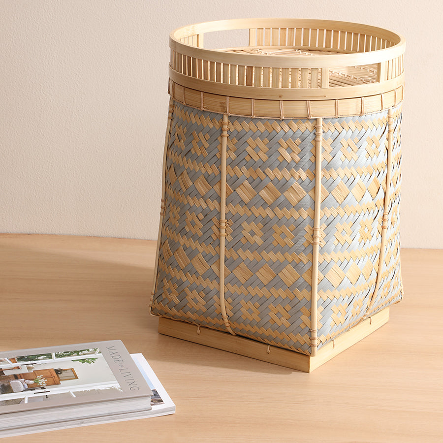 Handwoven bamboo basket, Decorative storage basket, Natural bamboo home décor, Artisan bamboo hamper, Minimalist bamboo storage basket for living room, Natural woven basket with lid for home organization, 
Japandi style home décor accessory, 
Handmade rattan storage basket for books or blankets .

Sustainable decorative bin for modern interiors