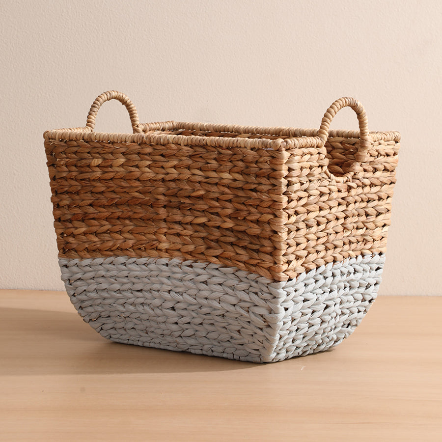 Two-tone woven basket, Handwoven seagrass storage bin, Natural fiber rectangular basket, Storage solution for toys and magazines, Laundry room organizer basket, Handmade seagrass basket, Rustic natural storage bin, Boho style woven organizer. 



