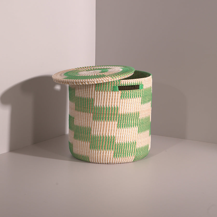 Green checkered woven basket, Woven storage basket with lid, Handwoven laundry hamper, Decorative basket with lid, Green and white woven decorative basket, 
Handmade basket for living room storage, Eco-friendly woven hamper with lid. 