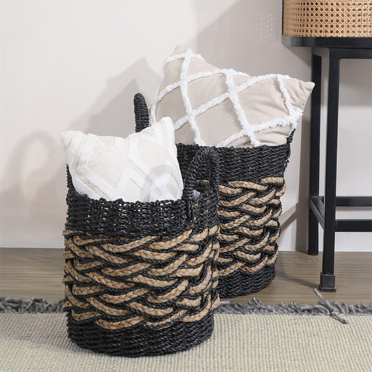 black and natural woven basket set, 
handwoven storage baskets with handles, seagrass and jute decorative baskets, braided rope storage hamper, Boho-style woven baskets, modern rustic storage baskets with pillows, two-tone woven floor baskets, large and small black braided baskets, handmade baskets for living room décor, stylish toy or blanket storage baskets. 
