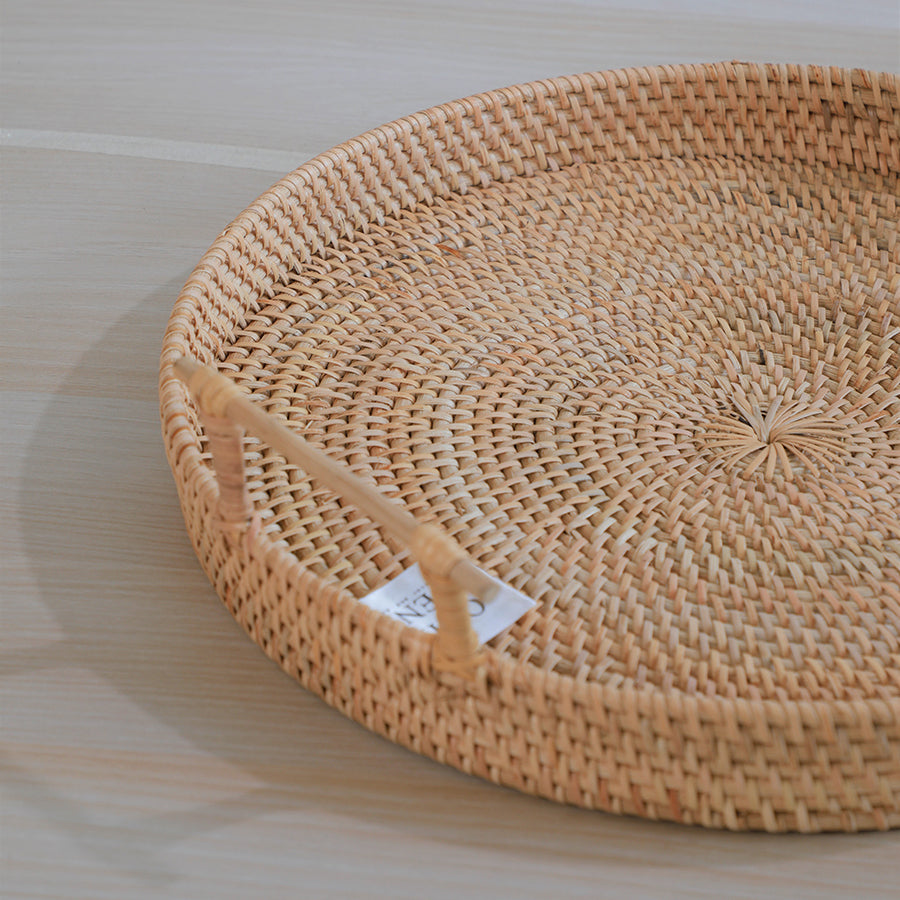 Round rattan tray, Handwoven wicker tray, Rustic serving tray with handles, Boho decorative rattan tray, Eco-friendly round tray, Coastal farmhouse décor tray, Artisan handmade rattan tray, Lightweight woven tray.

Wicker basket tray

Natural fiber rattan tray