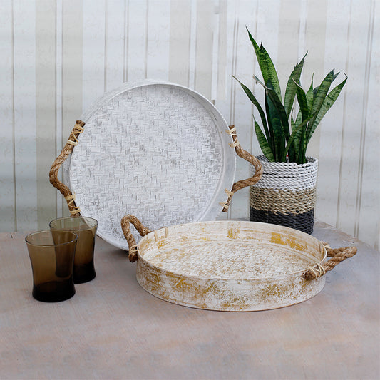 Round bamboo rope handle tray, 
Rustic whitewashed serving tray, 
Handwoven wicker tray set, Farmhouse style round trays, Natural fiber rope trays, Decorative trays for coffee table, Handcrafted bamboo trays with rope handles, White and gold distressed tray set, Boho rustic serving tray décor, Eco-friendly handcrafted tray set. 