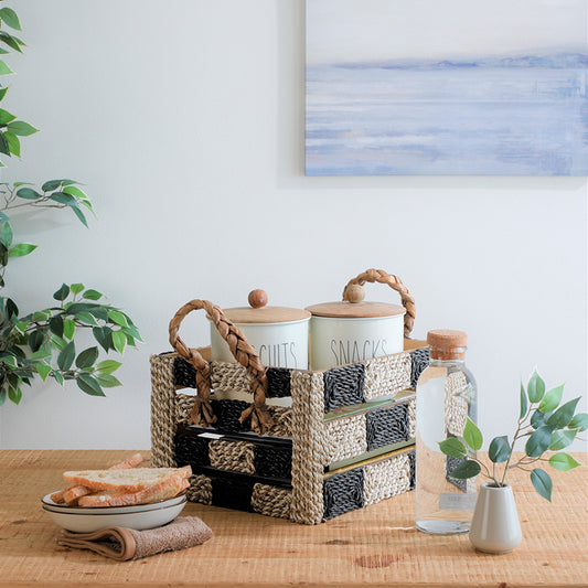 Black and white woven storage basket, Decorative rope crate with handles, 
Two-tone woven organizer box, Seaweed and paper rope woven basket, Handmade eco-friendly basket, Kitchen counter storage bin, 
Tabletop snack organizer.