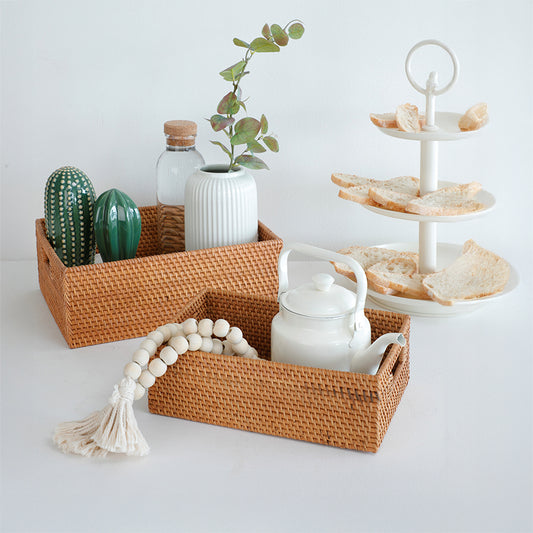 Handwoven rattan basket tray, Rectangular wicker storage basket, Natural rattan organizer tray, Multi-purpose woven basket, Decorative tabletop basket, Eco-friendly woven tray with handles, Rustic storage basket for kitchen or décor, Rattan baskets for serving and organizing, Handmade woven underbed basket, 
Minimalist rattan décor basket. 

