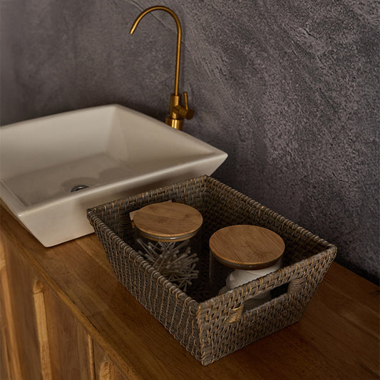 Bathroom counter wicker basket, Woven vanity organizer bin, Handwoven rattan basket with handles, Rustic bathroom storage basket, Natural fiber sink organizer, Boho bathroom accessories basket, 
Eco-friendly countertop basket, Rectangular woven basket for toiletries, Glass storage jars with bamboo lids, Bathroom glass canisters, Airtight jars for cotton pads & swabs, Apothecary-style glass jars, 
Reusable bathroom storage containers, Glass jars with wooden top. 


