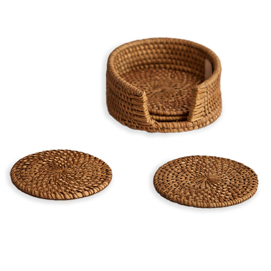 Handwoven rattan coaster set, 
Natural wicker coasters, Rustic drink coasters with holder, Boho style table coasters, Eco-friendly woven cup mats, Handmade water hyacinth coasters, Round wicker coaster set, 
Sustainable beverage coasters, 
Coastal home décor coasters, Rattan table accessories. 