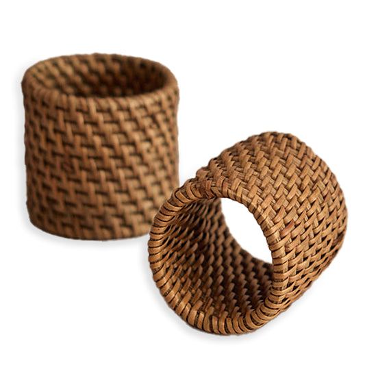 Handwoven rattan napkin ring, 
Boho table napkin holder, Rustic wicker napkin rings, Natural fiber napkin ring set, Eco-friendly woven napkin rings, Coastal style table décor, Handmade rattan table accessories, Brown wicker napkin holders, Organic dinner table napkin ring, Tropical dining napkin accents. 