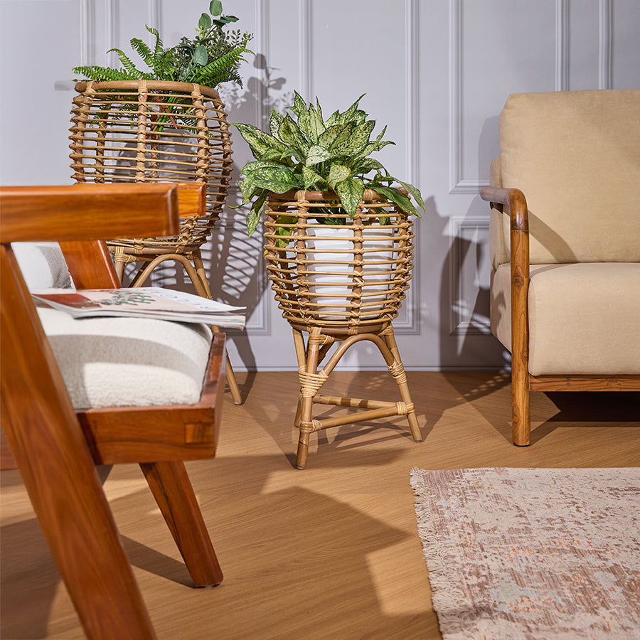 Rattan planter with stand, Indoor rattan plant stand, Boho plant holder, 
Wicker planter with legs, Decorative rattan plant pot, Rattan plant stand indoor, Natural fiber planter, Bamboo-style plant pot stand, Handwoven plant stand, Mid-century modern plant holder .
