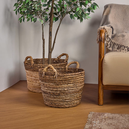 Banana leaf storage baskets, Woven natural baskets with handles, 
Handcrafted banana fiber baskets, 
Eco-friendly round storage baskets, 
Rustic woven home décor, Natural baskets for indoor plants, Large woven basket for blankets, Sustainable storage baskets, 
Decorative round woven bins, 
Braided baskets for living room .