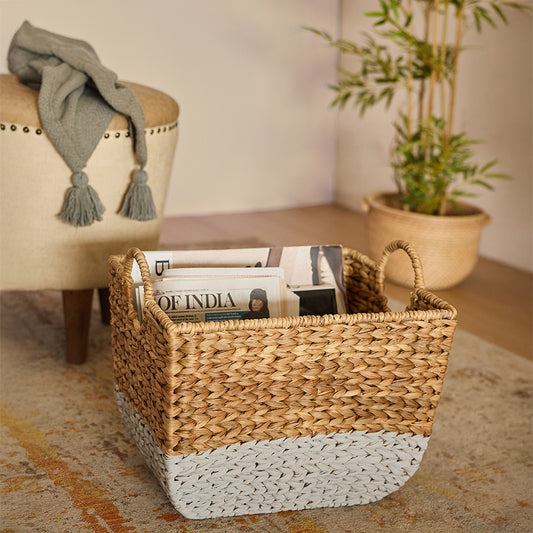 Decorative seagrass basket for living room, Rectangular woven storage bin, Magazine holder basket for cozy corners, Decorative basket for home décor, Neutral tone home organizer basket, Artisanal handwoven basket for stylish interiors, Seagrass home organizer with sturdy rope handles, Rustic and modern woven basket for indoor storage.

