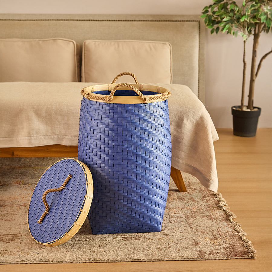 Blue woven laundry basket, Lidded wicker hamper, Rattan storage basket with lid, Decorative laundry bin, Handcrafted woven hamper, Rope handle laundry basket, Bedroom storage basket, Stylish wicker laundry bin, Blue rattan hamper with cover, Boho home organization basket. 