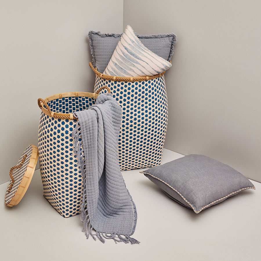 Handwoven storage basket, Blue geometric basket with lid, Artisan wicker basket, Decorative hamper for laundry, Eco-friendly woven organizer, Lidded seagrass basket, 
Coastal décor storage solution, 
Handmade basket with blue accents, 
Natural fiber laundry hamper.