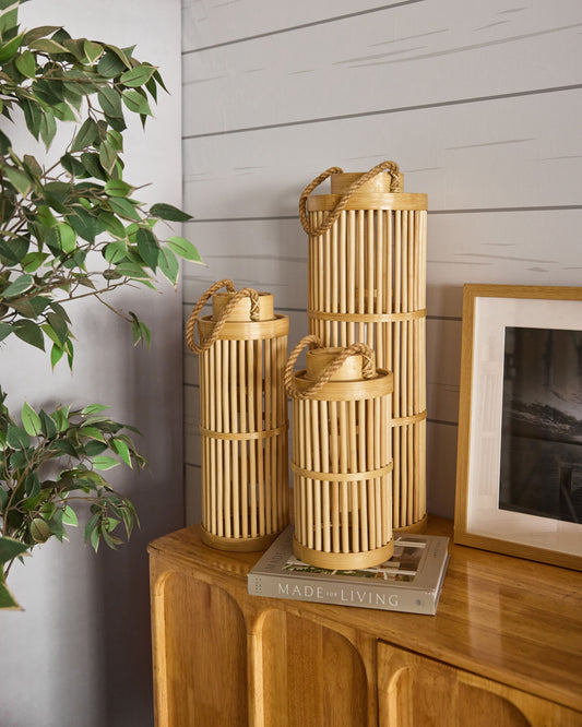 Bamboo lanterns, Wooden lanterns. 
Natural bamboo candle holders, 
Rustic home décor accents, Boho lantern décor, Japandi style accessories, Lanterns for living room décor, Decorative lanterns for console table, Entryway lantern décor. Indoor bamboo lighting, 
Tabletop lantern display.