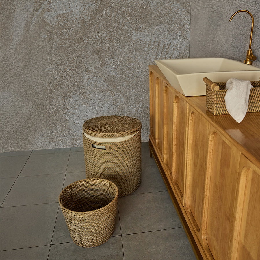 Woven bathroom basket set, Rattan laundry hamper with lid, Round wicker waste bin, Small rattan basket with handles, Natural fiber bathroom storage set, Eco-friendly wicker hamper, Handwoven bathroom accessories, Rattan storage solutions for bathroom, Decorative bathroom basket trio, Stylish bathroom organization baskets. 

