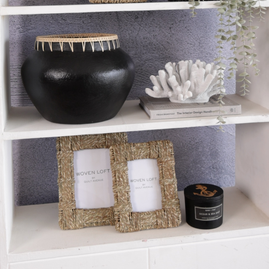 Black terracotta pot, Boho decorative vase, Handmade tribal-style vase, 
Rustic modern urn, Ethnic home décor pot, Matte black ceramic planter, Woven rim pottery, Woven rattan photo frame, Rustic natural fiber picture frame, Handmade wicker frame, Boho style photo frame, Eco-friendly photo frame, 
Decorative table photo frame, Jute rope picture frame, Ocean & Sea Salt scented candle, Luxury black jar candle, Nautical theme candle, Soy wax candle in glass jar, Decorative scented candle.

