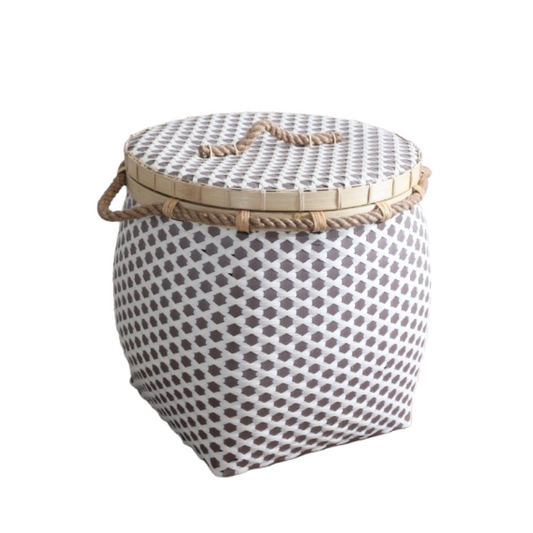 brown and white woven basket, 
lidded storage basket with rope handles,  patterned laundry hamper,
Boho woven storage bin, handmade rattan-style basket, eco-friendly laundry basket with lid, rustic chic woven container, decorative basket with lid and handles, multi-purpose woven bin, plastic weave storage basket.