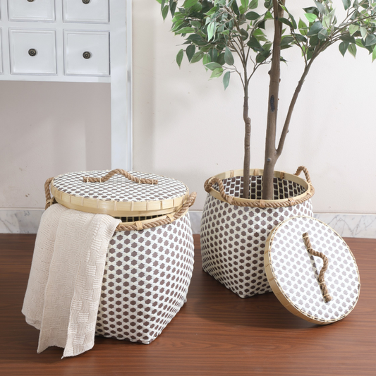 brown and white woven storage basket, multipurpose lidded basket with rope handles, Boho home décor basket, stylish laundry hamper with lid, eco-friendly storage solution, 
decorative woven bin for living room,
handwoven basket with lid, 
plant holder basket with rustic style, 
home organization storage basket, 
modern basket with natural rope handles.