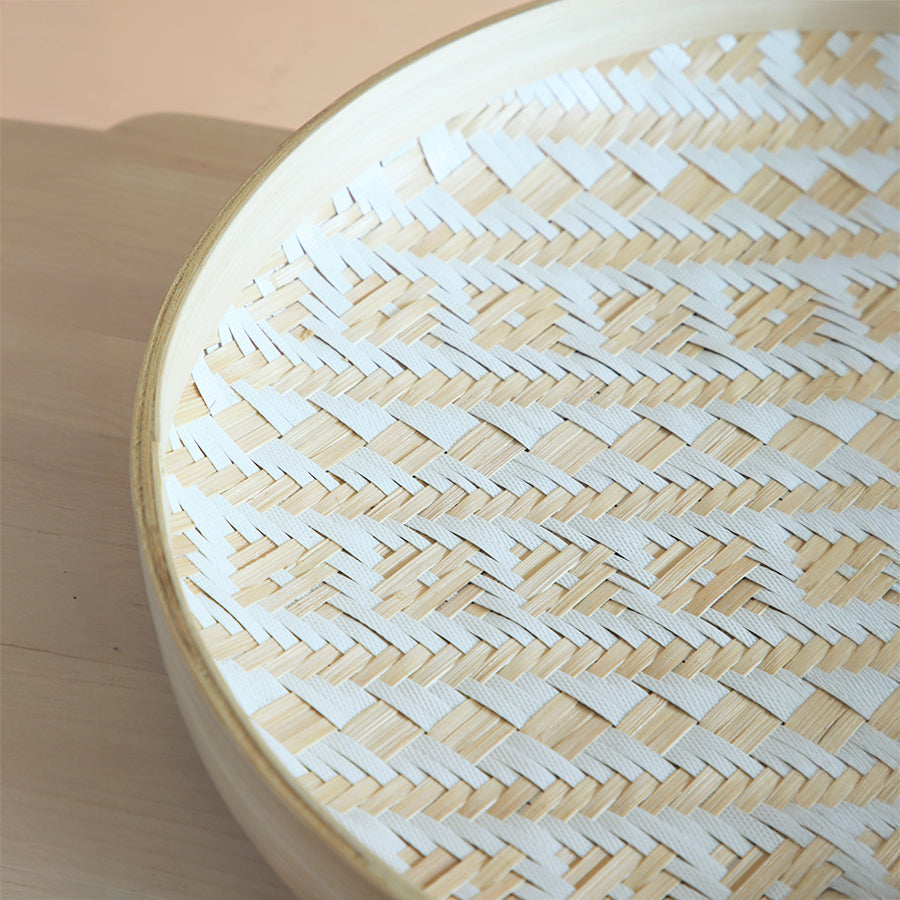 Woven bamboo tray, Bamboo wall tray, Round serving tray bamboo, Handwoven bamboo platter, Natural and white bamboo tray, Aztec pattern tray, Rustic woven tray, Boho bamboo décor tray, Aztec design bamboo tray, White accent woven tray, 
Bohemian style serving tray, Tribal patterned bamboo tray, Handcrafted geometric tray, Decorative bamboo wall basket. 

