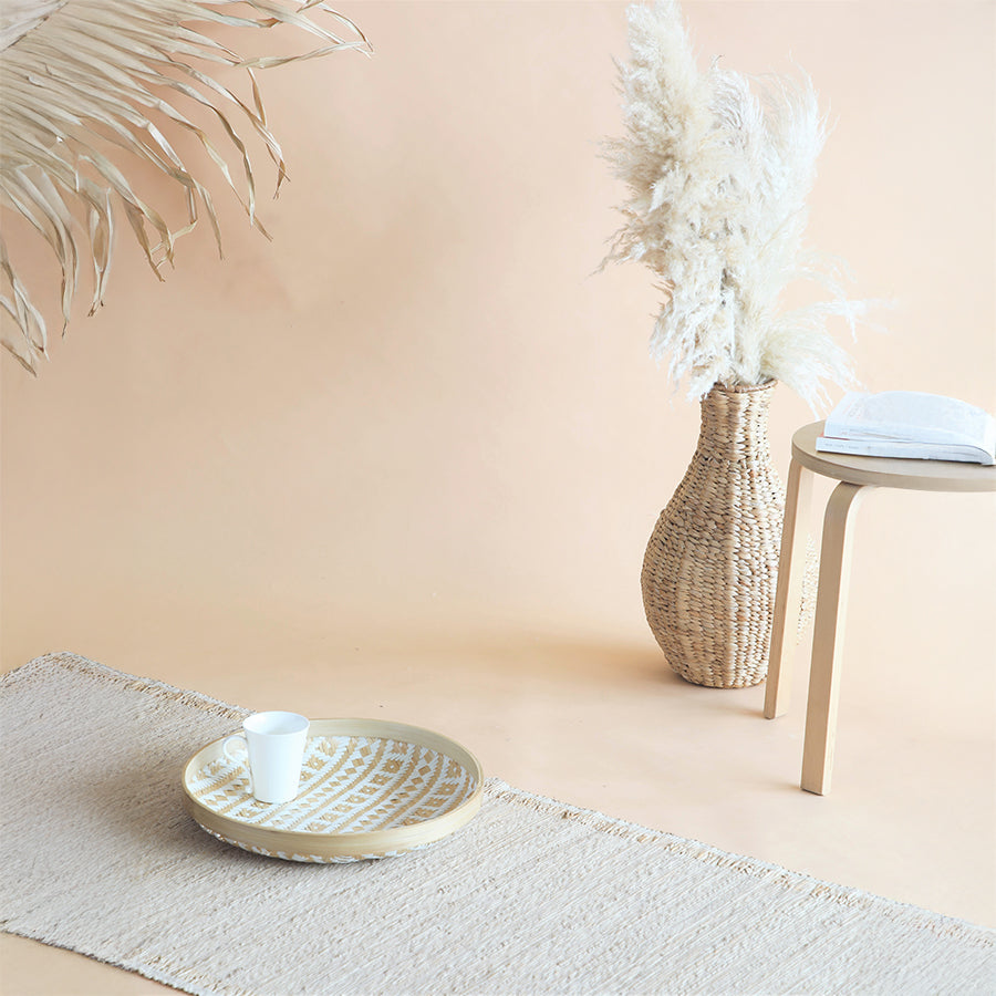 Boho serving tray, Aztec pattern bamboo tray, Handwoven bamboo platter, Natural and white bamboo tray, Decorative bamboo wall décor, Round bamboo tray for display, Eco-friendly handmade tray, Pampas grass décor, Dried pampas arrangement, Tall woven floor vase, Boho vase with pampas grass, Rattan vase with dried florals, Natural grass home décor. 

