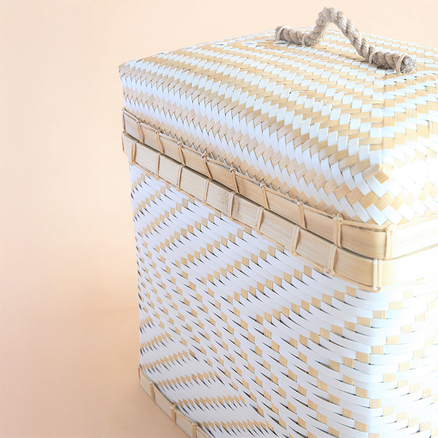 White woven bamboo storage basket, Handwoven trunk basket with lid, Chevron pattern laundry hamper, Eco-friendly bamboo storage bin, 
Sustainable lidded organizer basket, 
Natural fiber woven hamper, Boho chic home storage basket, Decorative square wicker basket, Artisan crafted storage box, Coastal white trunk basket, Minimalist wooden bench, Japandi style pine bench, Light wood indoor bench, Rustic entryway seating, Modern Scandinavian bench. 